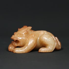 An Exquisite White Jade Auspicious Beast Ornament