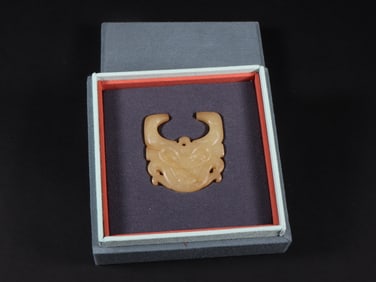 An Exquisite White Jade Beast-Face Pattern Ornament