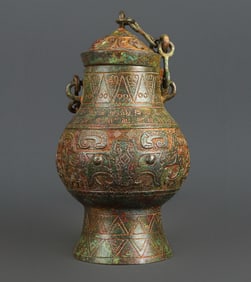 An Exquisite Bronze Beast-Face Pattern With Inscription Vase