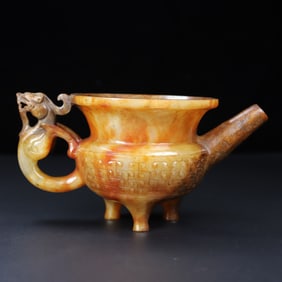 An Exquisite White Jade Tripod Ewer