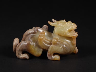 An Exquisite White Jade Auspicious Beast Ornament