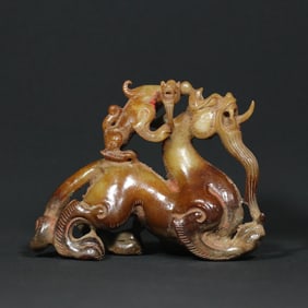 An Exquisite White Jade Auspicious Beast Ornament