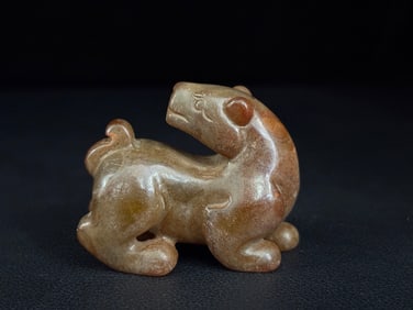 An Exquisite White Jade Auspicious Beast Ornament