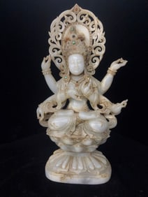 An Exquisite White Jade Inlaid Gems Buddha Statue