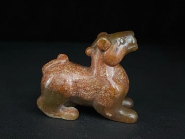 An Exquisite White Jade Auspicious Beast Ornament