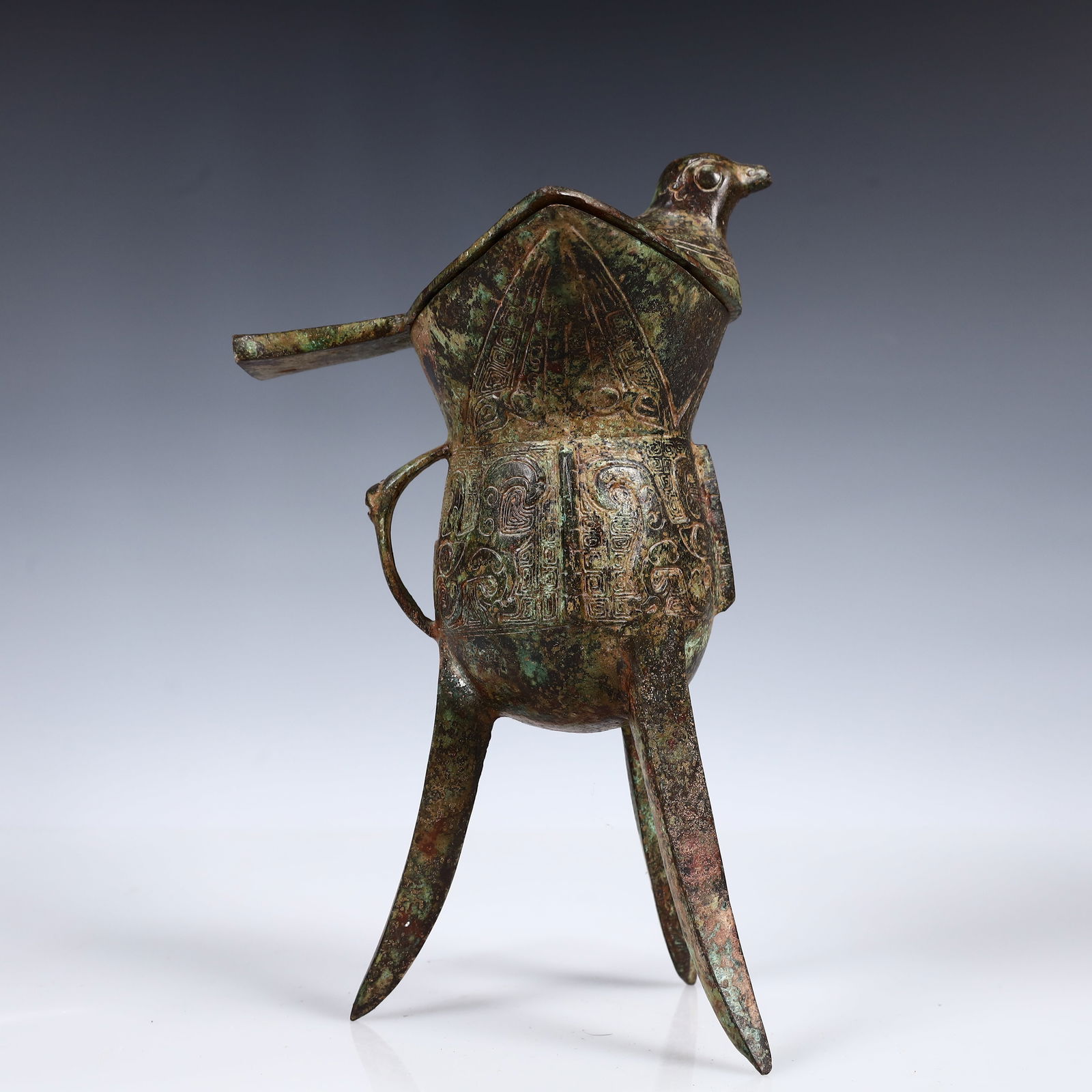 A Rare Bronze Goblet: A Rare Bronze Goblet,Shang Dynasty, China,Size:6.7inx5.9inx9.4in,Weight:1200g 青铜爵杯,中国商代