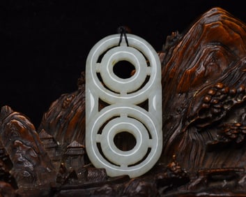 An Exquisite White Jade Pendant