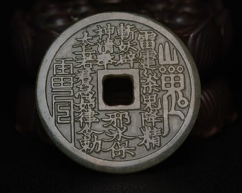 An Exquisite Jadeite Pendant