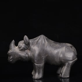 An Archaic Hongshan Culture Black Jade Rhinoceros Ornament