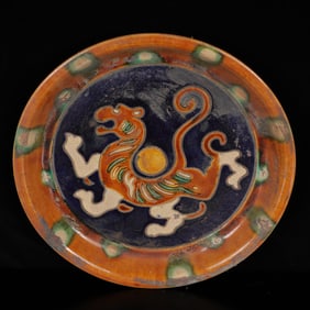 An Exquisite Tang Tri-Color Glazed Pottery Auspicious Beast Plate