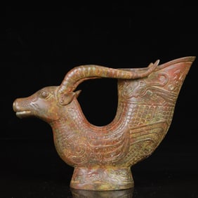 An Archaic Bronze Sheep Libation Cup