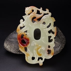 An Exquisite White Jade Dragon Pendant