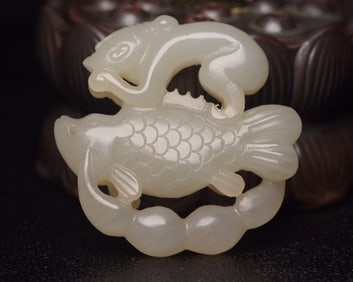 An Exquisite White Jade Fish Pendant