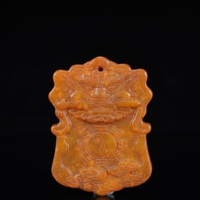 A Rare Gaogu yu Lion Pendant