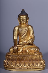 A Rare Gilt Bronze Statue of Sakyamuni