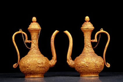 A pair of exquisite gilt bronze ewers with auspicious animal patterns
