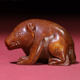 An Exquisite Archaic jade Bear Ornament