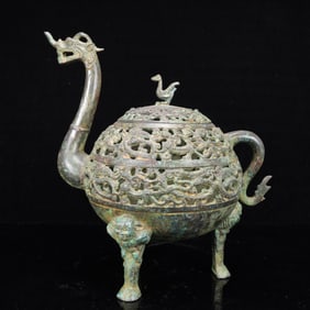 An Archaic Bronze Auspicious Beast Tripod Censer