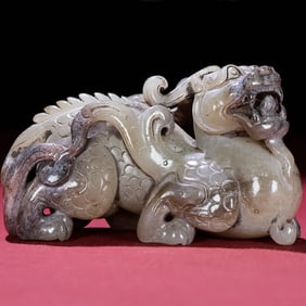 An Exquisite White Jade Auspicious Beast Ornament