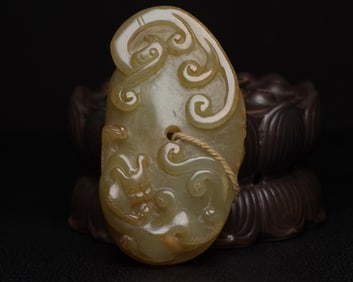 An Exquisite White Jade Dragon and Phoenix Pattern Pendant
