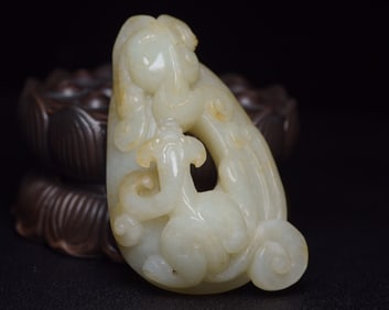 An Exquisite White Jade Dragon Pendant