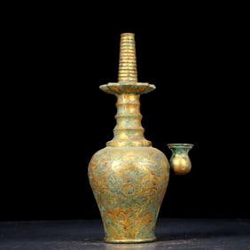 An exquisite gilt bronze vase with floral patterns