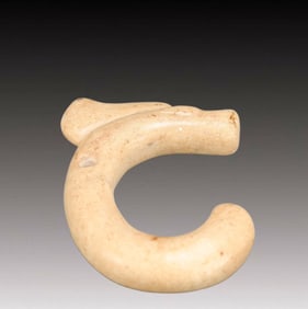 An Archaic Hongshan Culture Yellow Jade Pig and Dragon Pendant