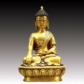 A Solemn Gilt Bronze Statue of Sakyamuni