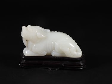 An Exquisite White Jade Auspicious Beast Ornament