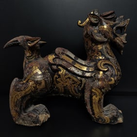 An Exquisite Bronze Inlaid Gold and Silver Auspicious Beast Ornament