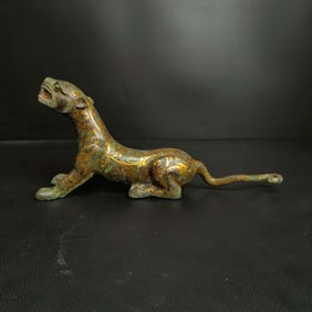 An Exquisite Bronze Inlaid Gold Auspicious Beast Ornament