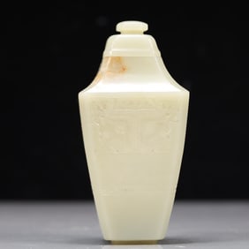 An Exquisite Green Jade Beast-Face Pattern Vase