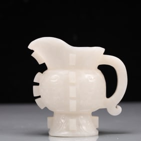 An Exquisite White Jade Beast-Face Pattern Goblet