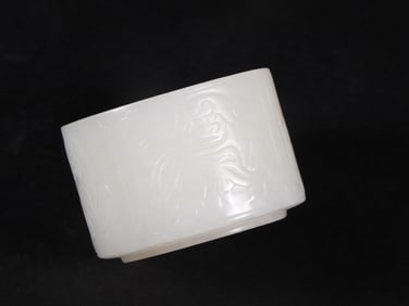An Exquisite White Jade Lion Pattern Cup