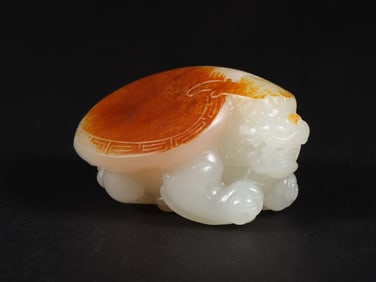 An Exquisite White Jade Auspicious Beast Ornament
