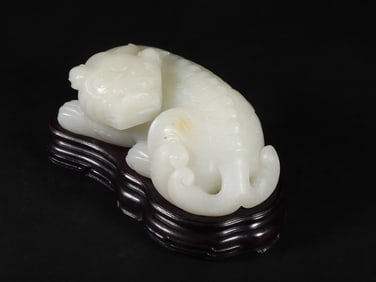 An Exquisite White Jade Lion Ornament