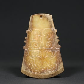 An Exquisite White Jade Beast-Face Pattern Ornament