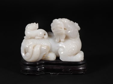 An Exquisite White Jade Lion Ornament