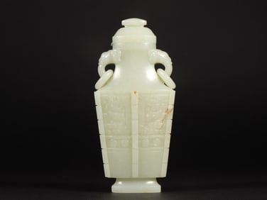 An Exquisite White Jade Beast-Face Pattern Double-Ears Vase
