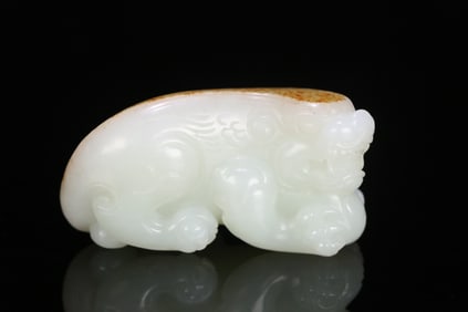 An Exquisite White Jade Auspicious Beast Hand Piece