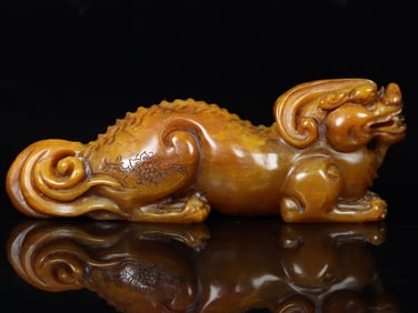 An Exquisite Tianhuang Stone Auspicious Beast Hand Piece