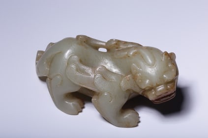 An Exquisite White Jade Auspicious Beast Ornament