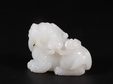 An Exquisite White Jade Auspicious Beast Ornament