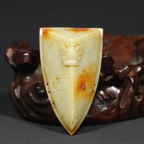 An Exquisite White Jade Beast-Face Pattern Ornament