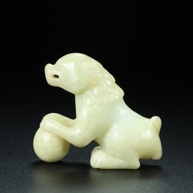 An Exquisite White Jade Lion Ornament