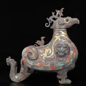 An Archaic Bronze Inlaid Gold and Silver Auspicious Beast Zun,Inlaid Gems