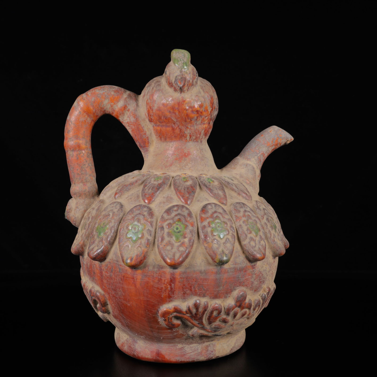An Exquisite Tang Tri-Color Glazed Pottery Flower and Bird Pattern Ewer: An Exquisite Tang Tri-Color Glazed Pottery Flower and Bird Pattern Ewer,Tang Dynasty,China,Size:9.8inx7.5inx7.5in,Weight:1260g 唐三彩花鸟纹执壶,中