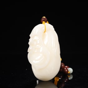 An Exquisite White Jade Pendant