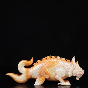 An Exquisite White Jade Auspicious Beast Ornament