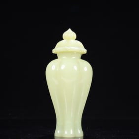 An Exquisite White Jade Flower-Shaped Bottle